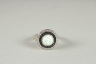 A SILVER DECO DESIGN TARGET RING.
