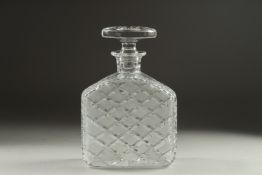 A GOOD HARRODS CUT GLASS LIQUERE DECANTER AND STOPPER, in a Harrods' bag