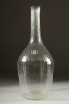 A LARGE BULBOUS DECANTER.