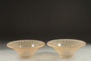 A PAIR OF COLOURED CIRCULAR LALIQUE BOWLS. Signed Lalique, France. 5.5ins deep.