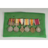 J. ARNOLD A.S. C. A GROUP OF 5 MEDALS: QUEENS SOUTH AFRICA MEDAL and four bars. George VII, South