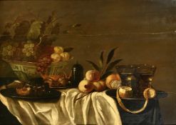 Attributed to Roelof Koets (1592-1655) Dutch, a still life of fruit and rummers on a tabletop, oil