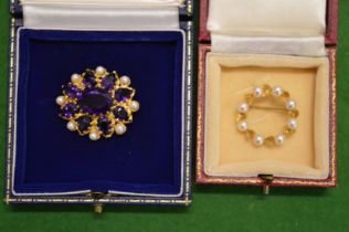 A decorative 9ct gold and gem set brooch together with another brooch.