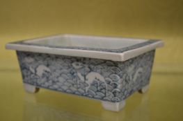 A Chinese small rectangular blue and white jardiniere.