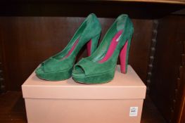 A pair of Ladies Mui Mui green suede shoes, size 37, boxed.