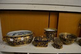 Gilt decorated pottery items to include an oval jardiniere, circular bowl, box and cover etc.