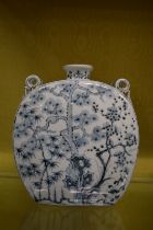 A good large Chinese blue and white slab sided vase with ring handles.