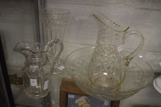 A good cut glass jug, a vase and a cut glass jug and bowl set.