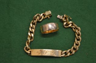 An 18ct gold curb link identity bracelet and a 9ct gold wedding band.