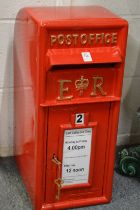 A reproduction cast iron post box.