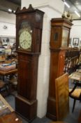 A 19th century mahogany longcase clock with eight day movement, painted arch dial (no pendulum,