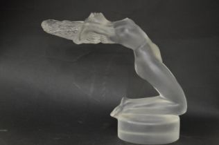 A Lalique glass car mascot modelled a reclining female nude.