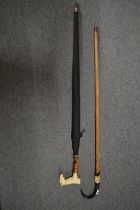 An umbrella, the handle modelled as a horse together with an Alpine walking stick.