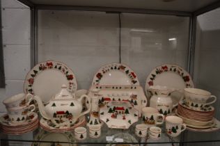 A large collection of Masons Christmas Village china.
