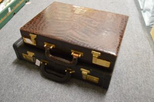 Two briefcases with combination locks (combination 584).