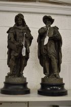 A pair of spelter figures depicting Rembrandt and Rubens.