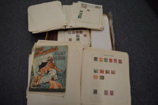 Quantity of stamp albums and loose stamps.