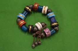 A set of colourful worry beads.