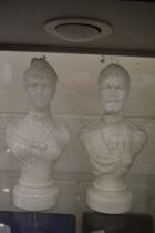 Three unusual moulded glass bottles and busts modelled as Russian figures.