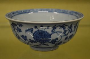 A Chinese blue and white circular bowl.