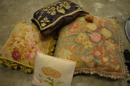 Embroidered cushions.