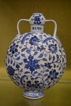 A Chinese blue and white moon flask.