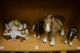 Decorative figural inkwell and three pottery shire horses.