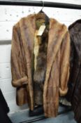 A Ladies mink coat and other items.