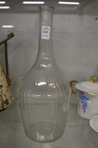 A Continental large glass carafe.