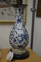 A Chinese blue and white baluster shaped vase lamp (faults).