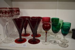 Cranberry and other glassware.