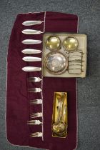 Silver items to include sauce ladle, fish knives and forks, a pair of salts etc.