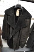 Vivienne Westwood, a Ladies black leather and faux fur trimmed coat.