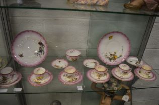 A Royal Worcester part coffee service decorated with birds.