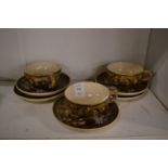 Japanese satsuma cups and saucers.