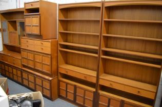 A collection of Nathan lounge furniture comprising: display units, chest of drawers, bookcases etc.