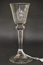 A large plain Georgian glass with double knop stem.