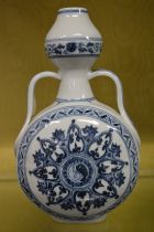 A Chinese blue and white moon flask.