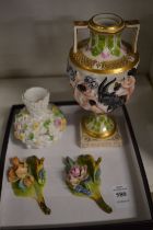 A Capodimonte urn and other decorative china.