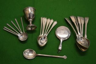 Silver flatware and other items.