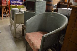 Two Lloyd loom style chairs, similar bedside cupboard and a small table.