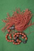 A set of colourful worry beads.