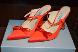 A pair of Ladies Prada red silk shoes, size 36.5, boxed.