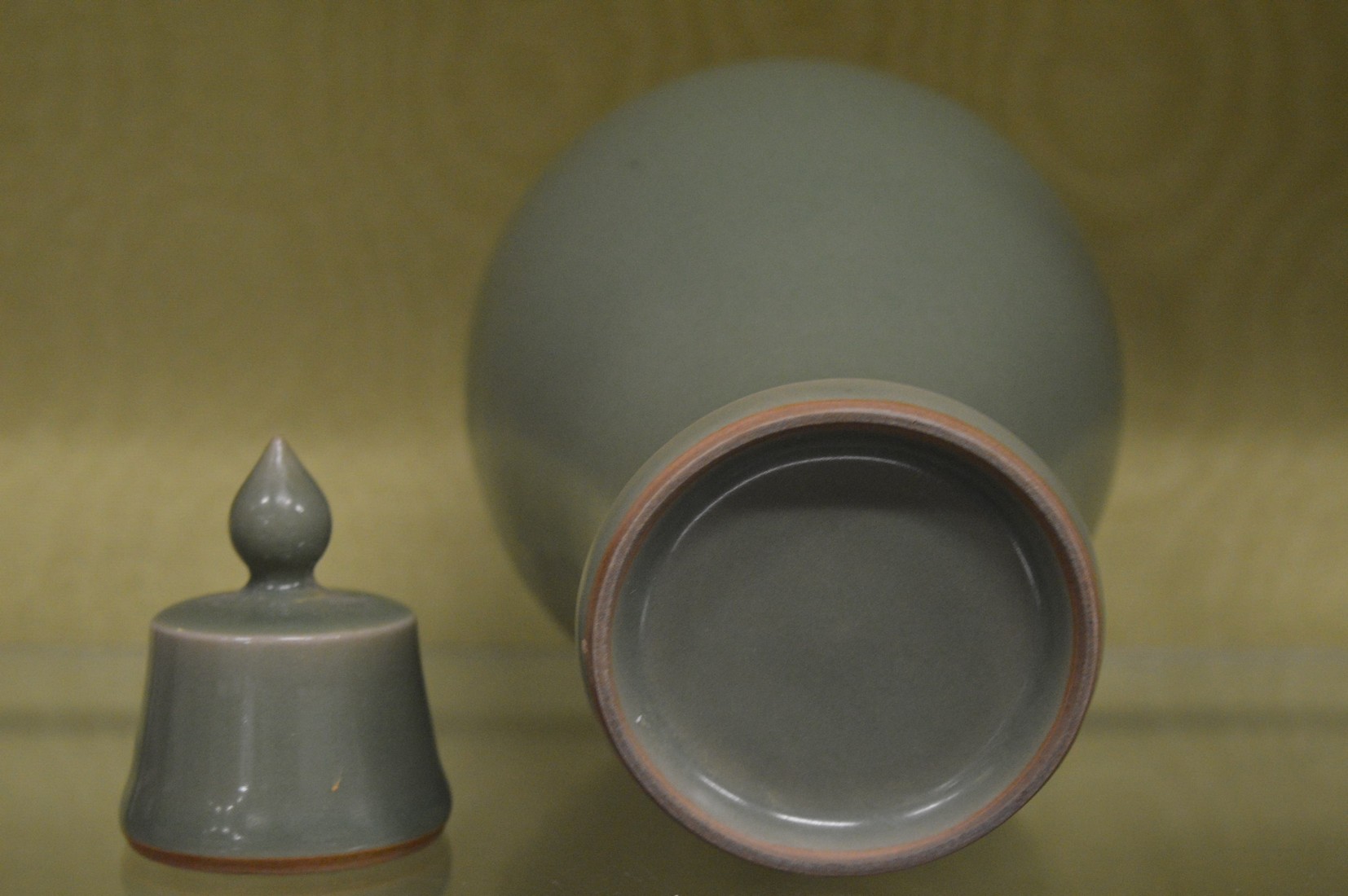 A Chinese celadon glazed baluster shaped vase and cover. - Image 2 of 2