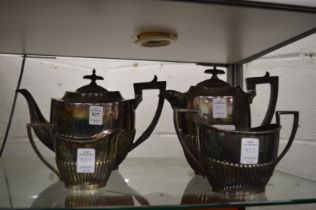 A plated four piece tea service.