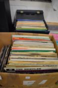 A quantity of records to include Beatles and numerous classical records.
