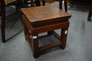 A Chinese stained elm stool or stand.