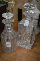 Two cut glass decanters.