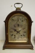 A good Georgian style mahogany cased mantel clock, the engraved silvered dial signed Hahn,
