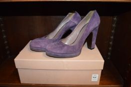 A pair of Ladies Mui Mui mauve suede shoes, size 36.5, boxed.